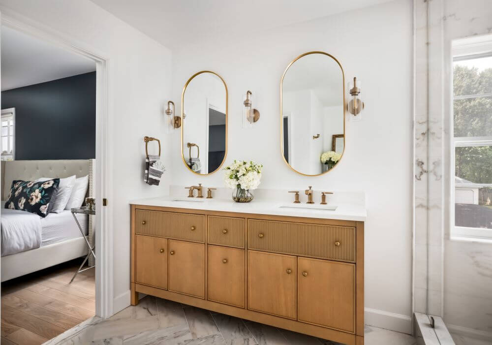 Expertly remodeled bathroom with custom tile and frameless shower in Northern Virginia home by Rosewood Building and Design